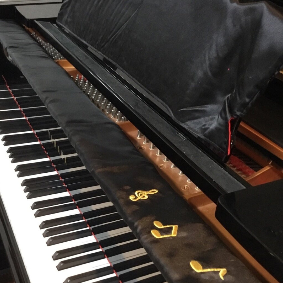 Prevention of falling gaps in the piano lid